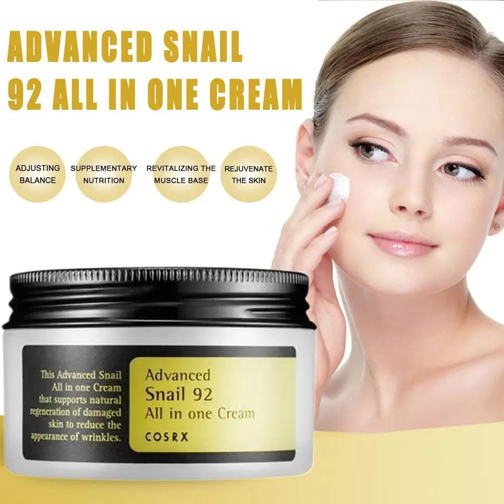 Cosrx Advanced Snail 92 All in One Cream with a woman applying it to her face.